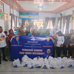 HUT Partai Demokrat Ke-24, MCA Bagikan Sembako Ke Rakyat